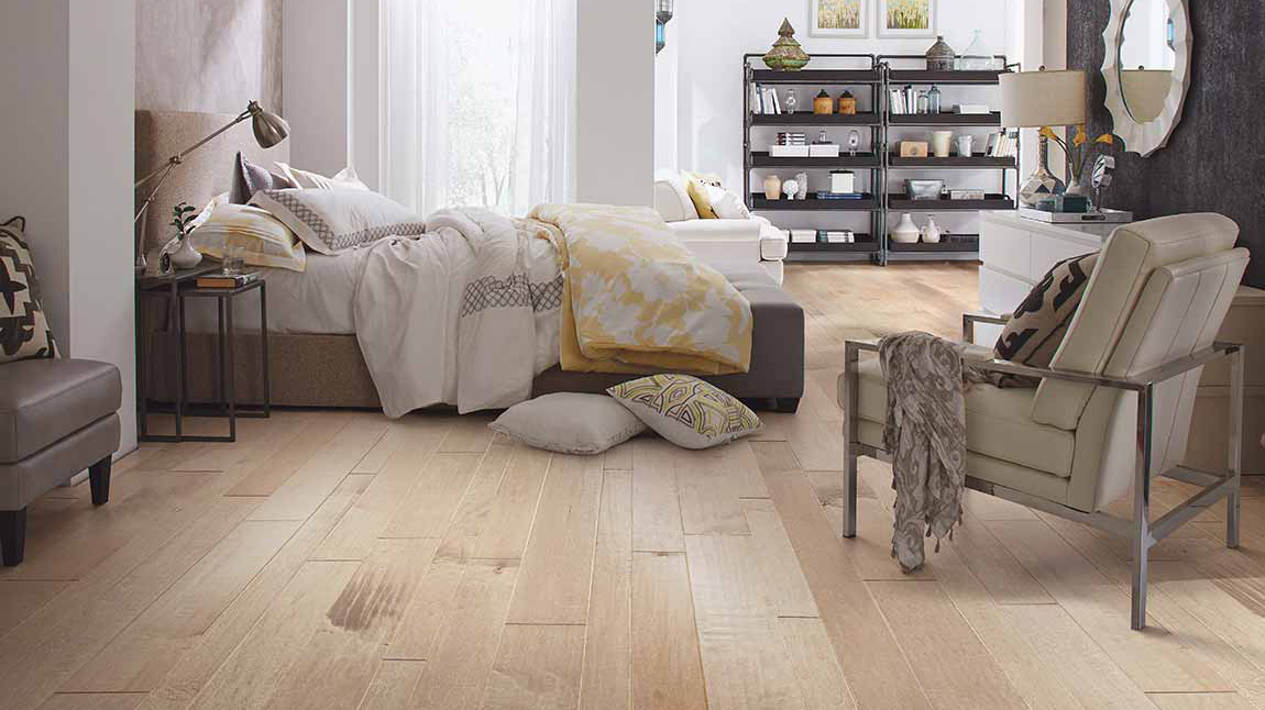 Hardwood flooring in a bedroom, installation services available